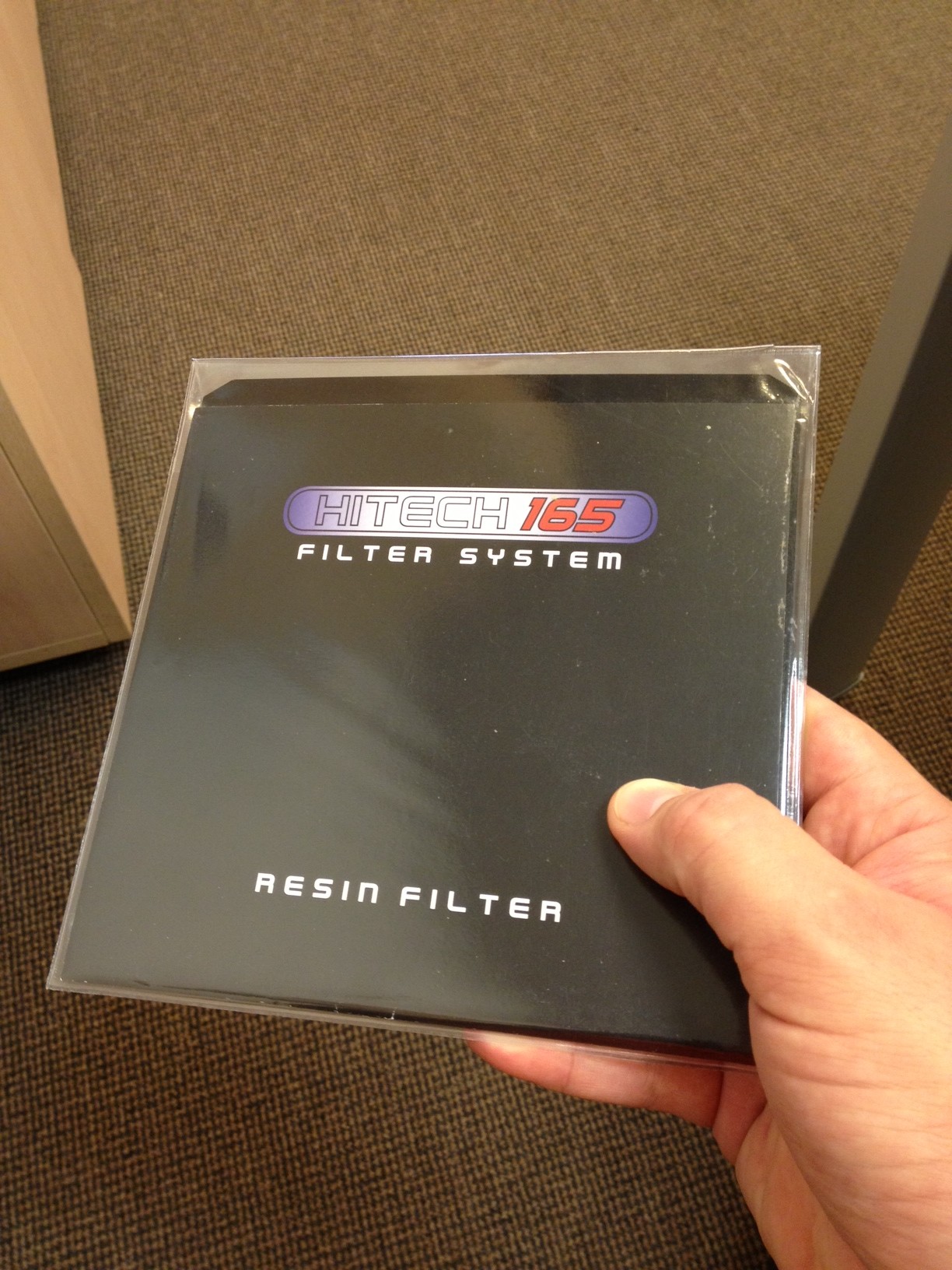 Filtro Hitech 165 para portafiltros de 10 pasos para sistema Lucroit, en su funda.